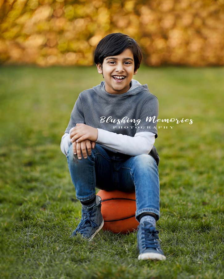 photo portrait of a boy in a park