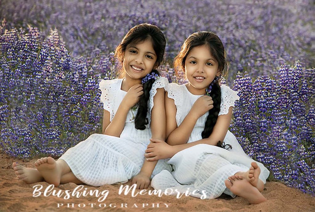 Outdoor photo Portrait of girls, in the lupine field