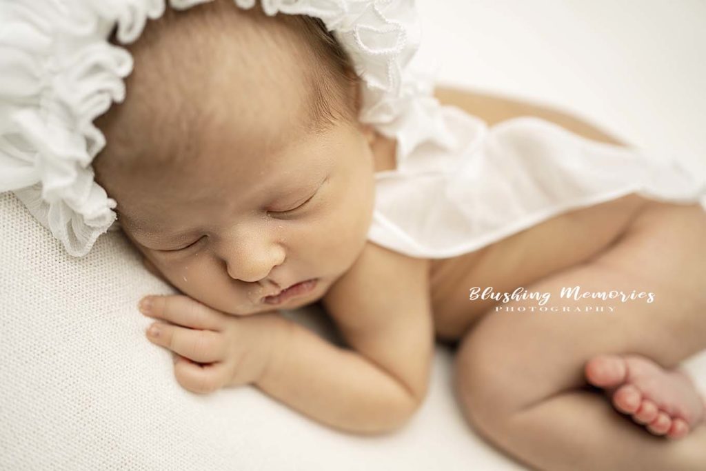 newborn baby girl posed photoshoot