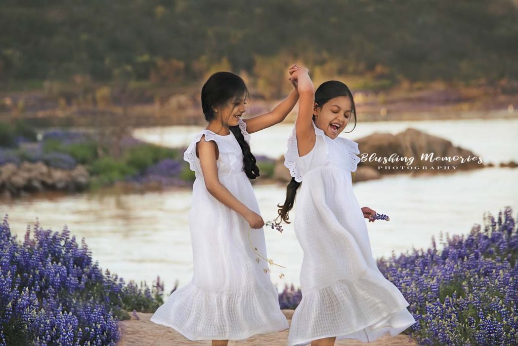 two sister portrait near the lake