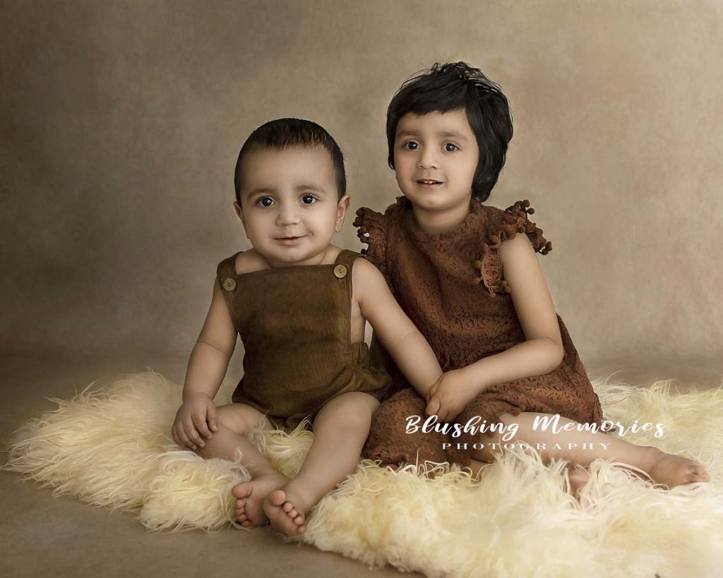 sibling photoshoot in a studio