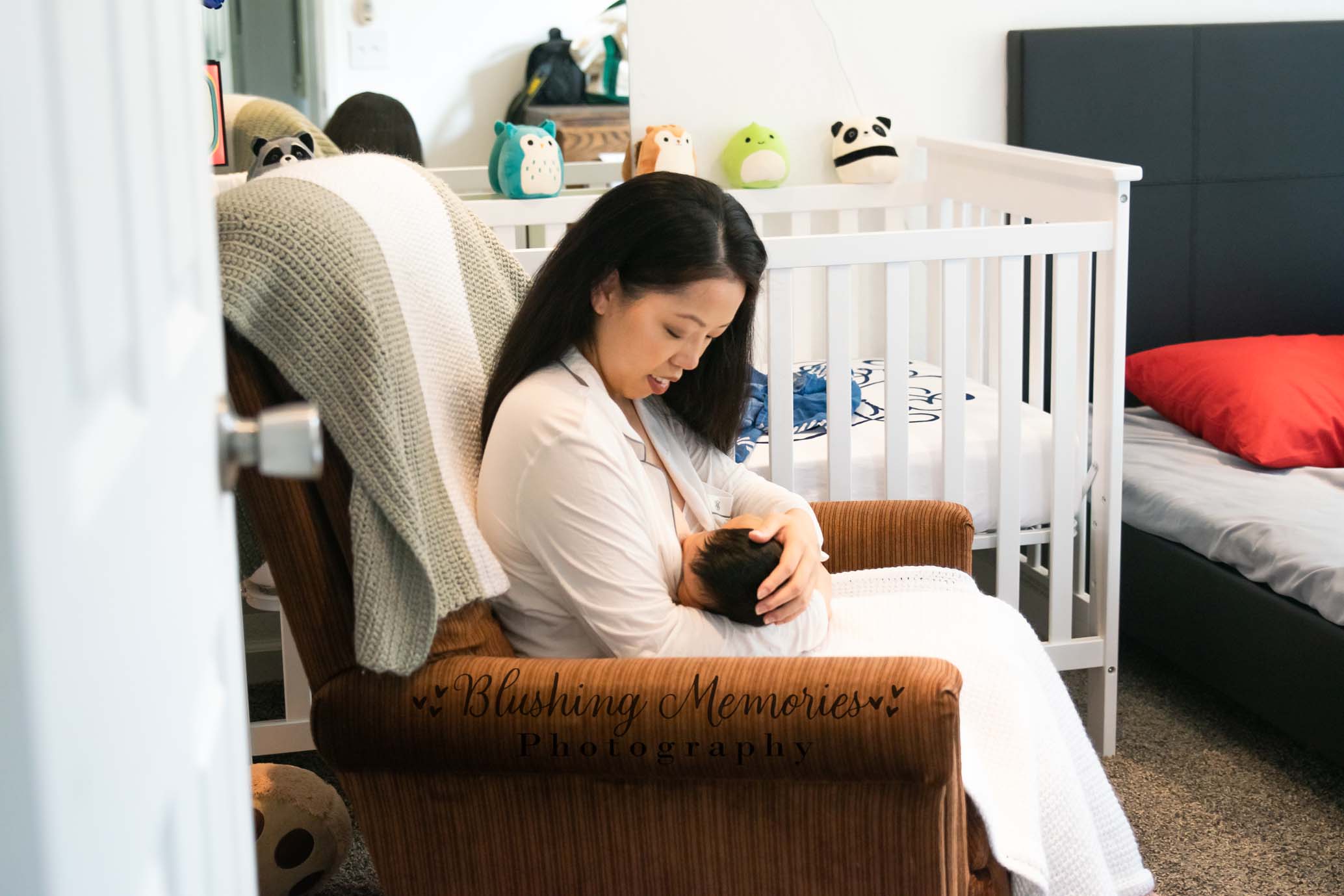newborn baby boy breastfeeding