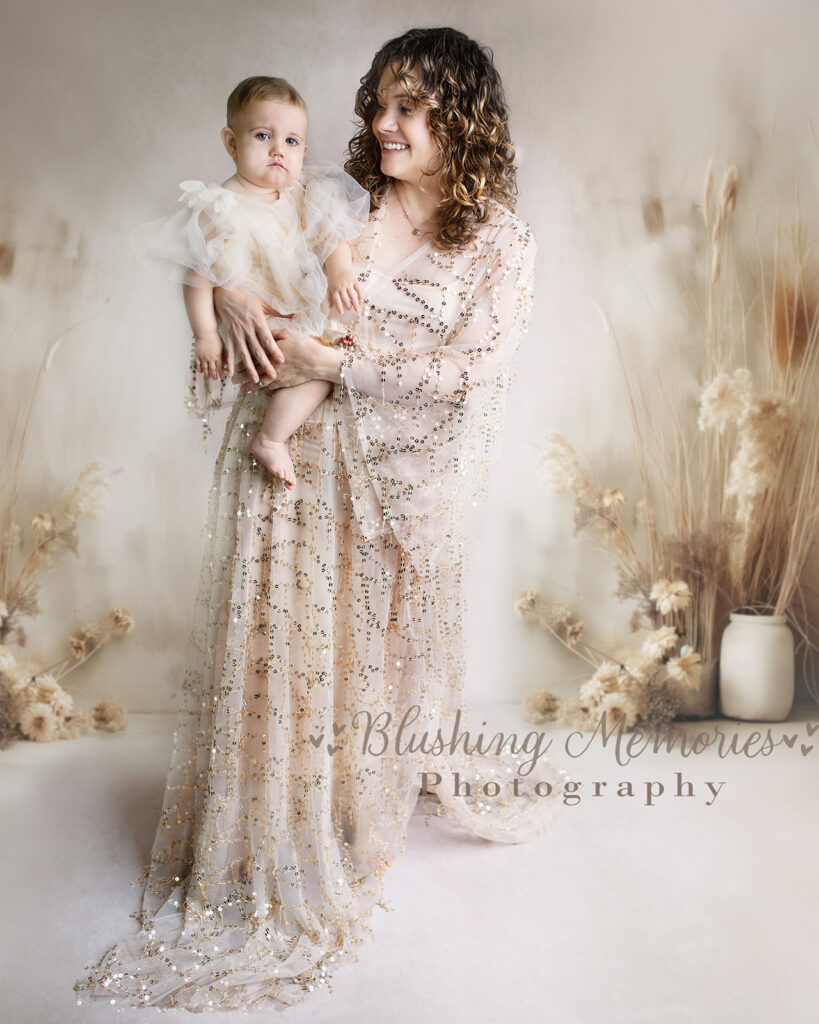 One year old girl portrait photo session with her mother in the studio of Blushing Memories, Eldorado Hills California
