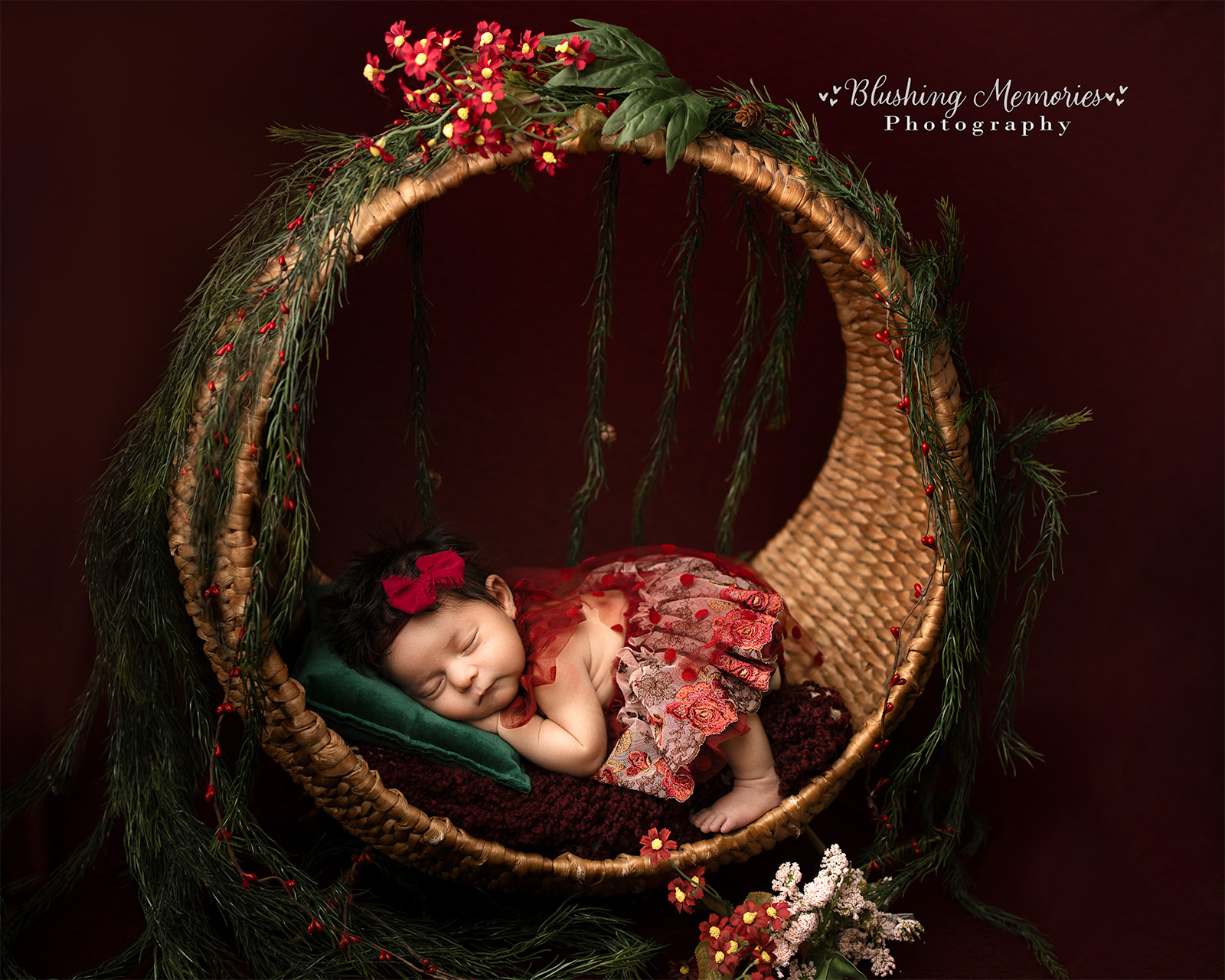 Artistic newborn baby girl portrait in floral wreath setup by Folsom newborn photographer