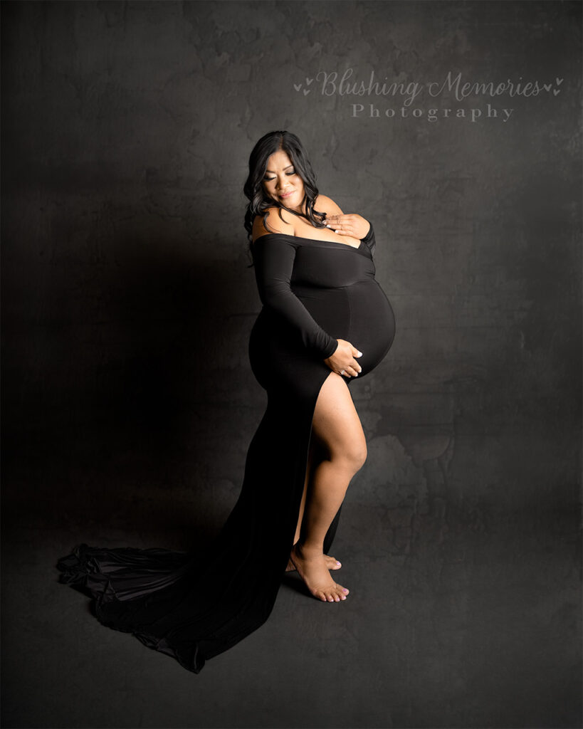 Luxury maternity portrait of expecting mother in black gown from Granite Bay at El Dorado Hills photography studio